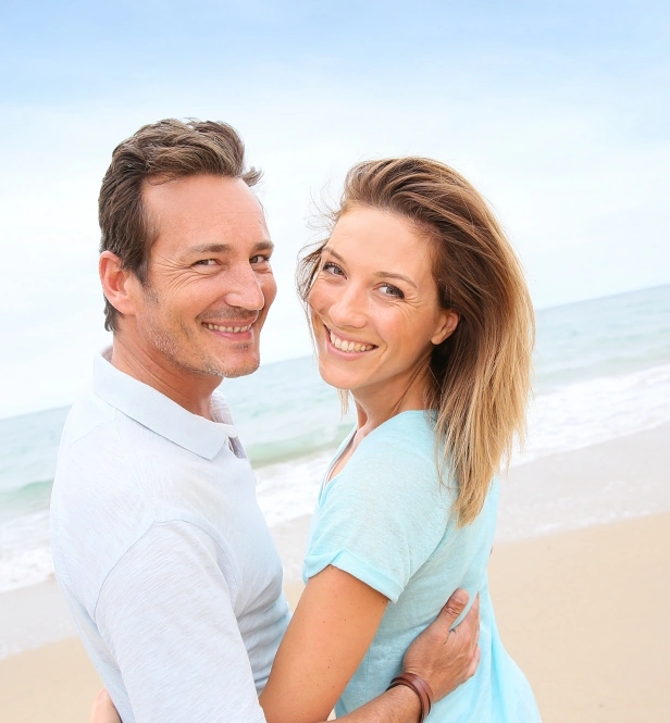 Couple outside in the sun at the beach