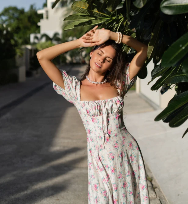 healthy energetic young woman in a dress