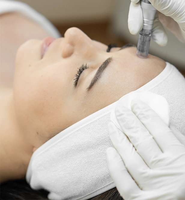 Woman receiving dermabrasion treatment