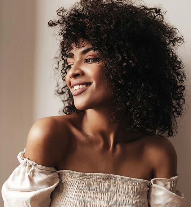 Portrait of smiling woman with smooth skin
