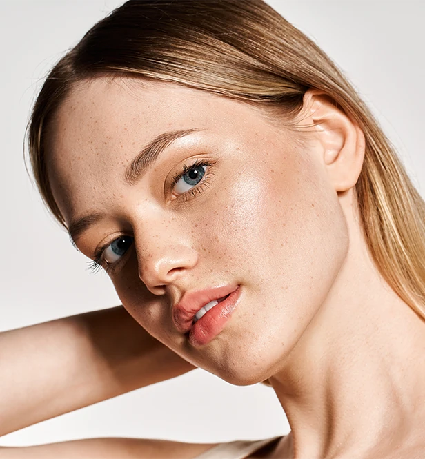 young confident woman with radiant skin